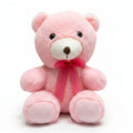 Pink teddy bear with a red bow on a marble surface with color swatches in the background.