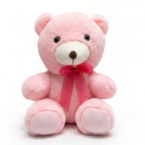Pink teddy bear with a red bow on a marble surface with color swatches in the background.