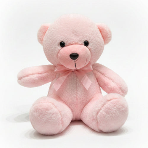 Pink teddy bear with a bow tie on a marble surface with a blurred background