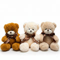 Decorative wall hanging made of teddy bear heads with brown bows in front of a color swatch chart.