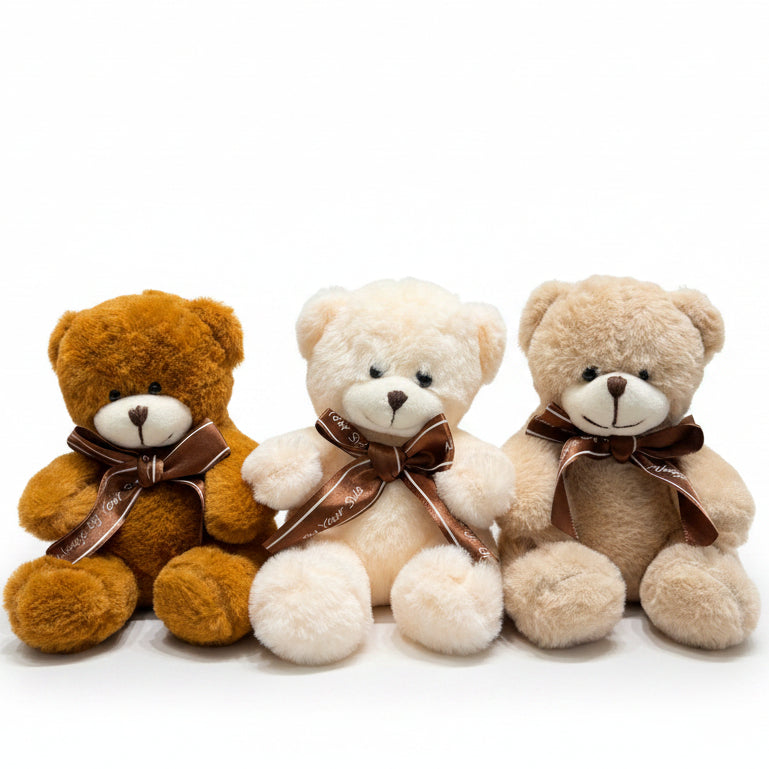 Decorative wall hanging made of teddy bear heads with brown bows in front of a color swatch chart.